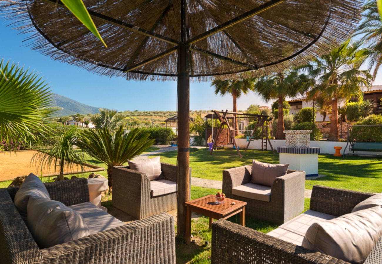 Casita Cuarta is een fijn kindvriendelijk vakantiehuis op een vakantieparkje met zwembad in Alhaurin el Grande, Andalusië