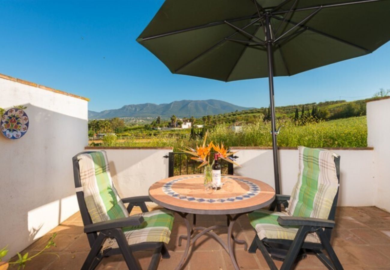 Casita Cuarta is een fijn kindvriendelijk vakantiehuis op een vakantieparkje met zwembad in Alhaurin el Grande, Andalusië